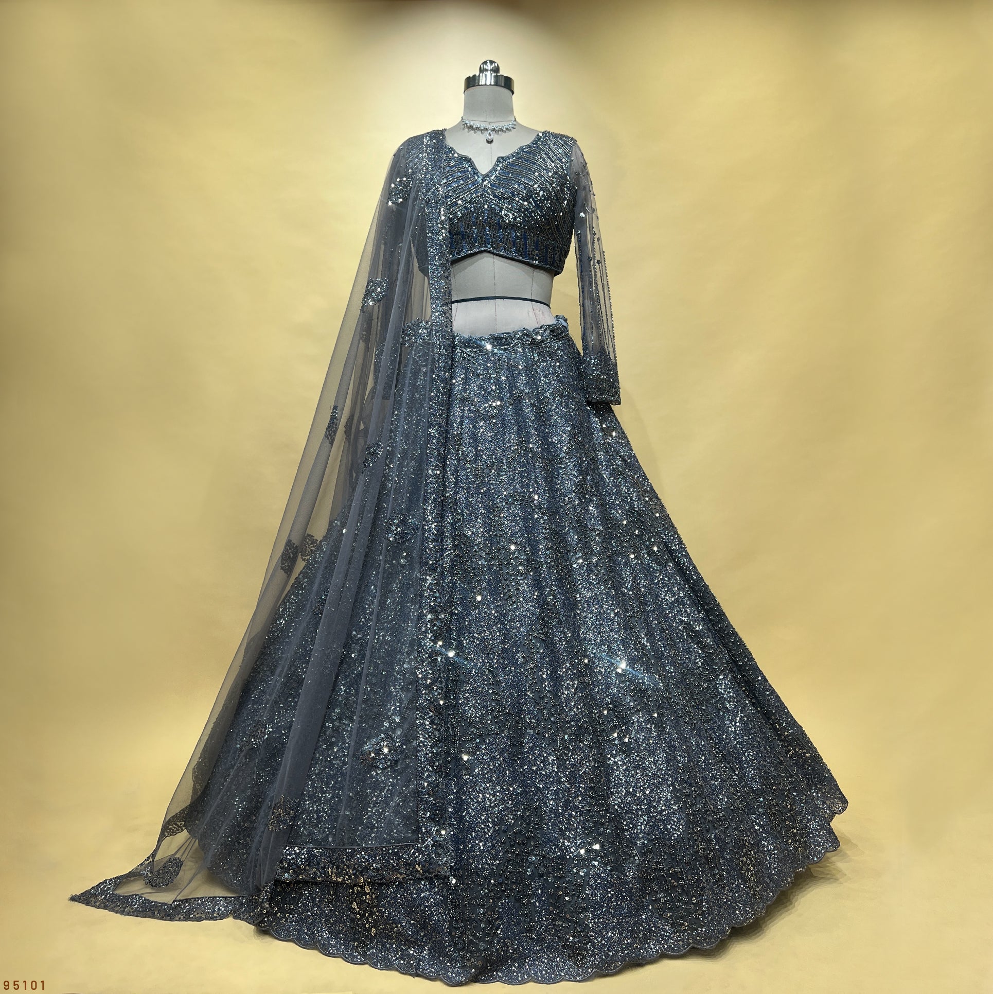 The Utsav Darbar: Grey Net Lehenga Ensemble I – Grey – view 1