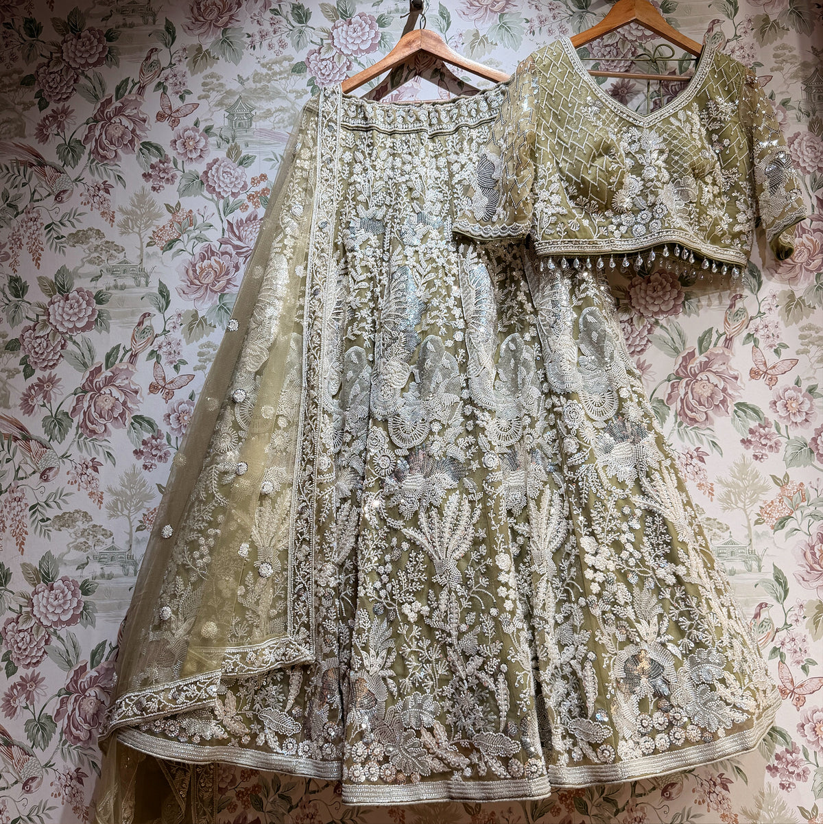 The Ananda Heirloom: Green Net Lehenga Ensemble II – Green – view 1
