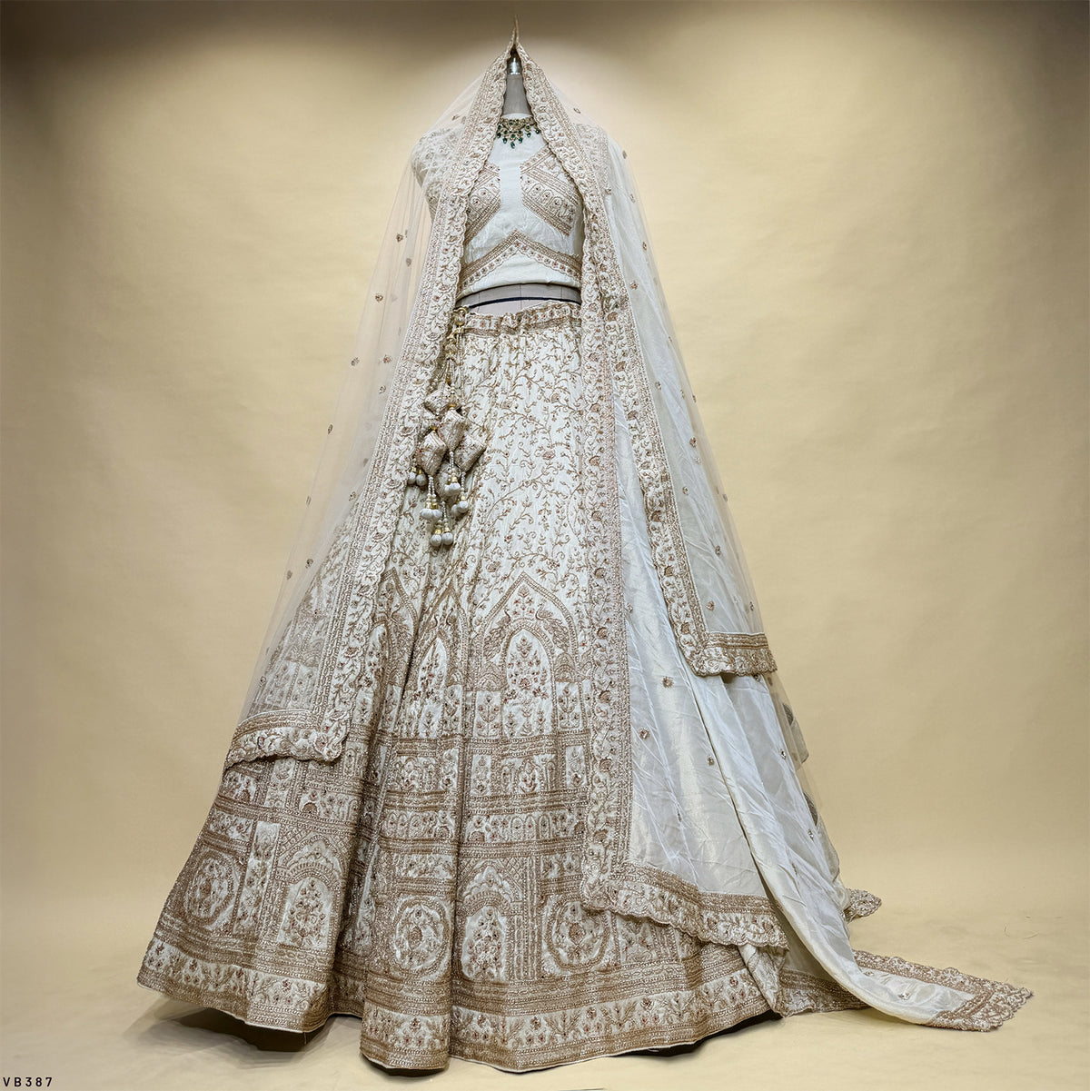 The Rajputana Darbar Edit: Ivory Silk Lehenga Ensemble III – Ivory – view 1