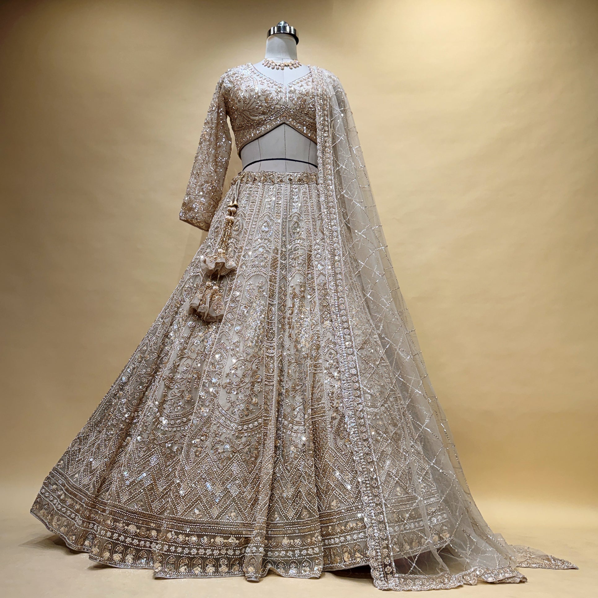 The Shagun Darbar: Ivory Net Lehenga Ensemble IV – Ivory – view 1