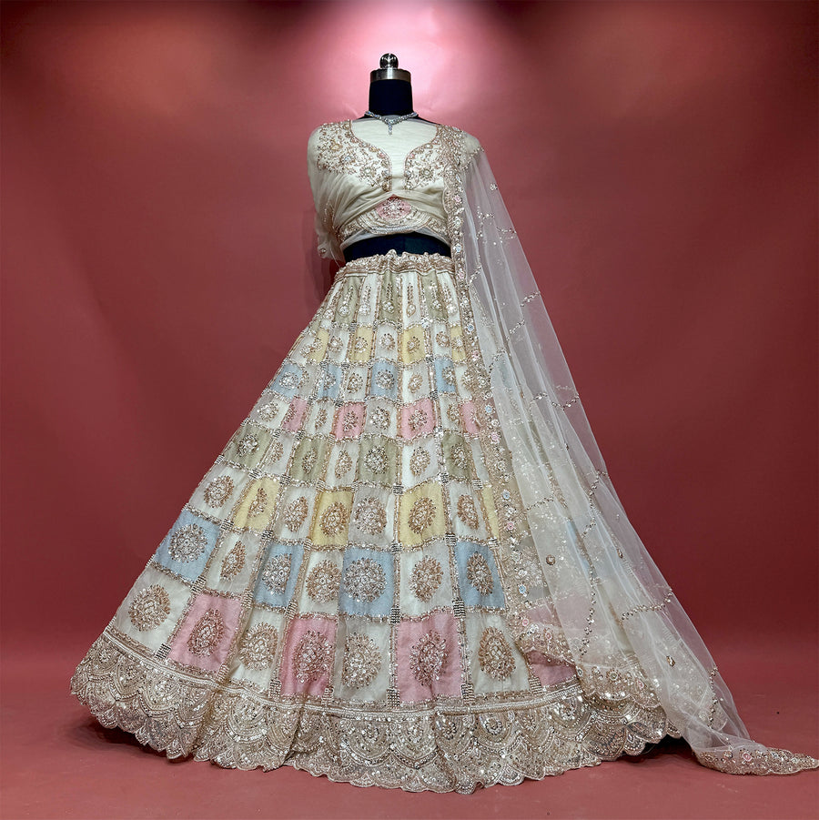 The Aangan Collection: Off White Multi Colour Lehenga Ensemble