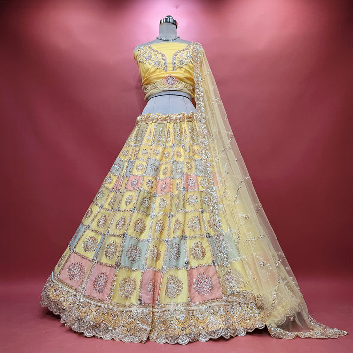 The Aangan Collection: Off White Multi Colour Lehenga Ensemble