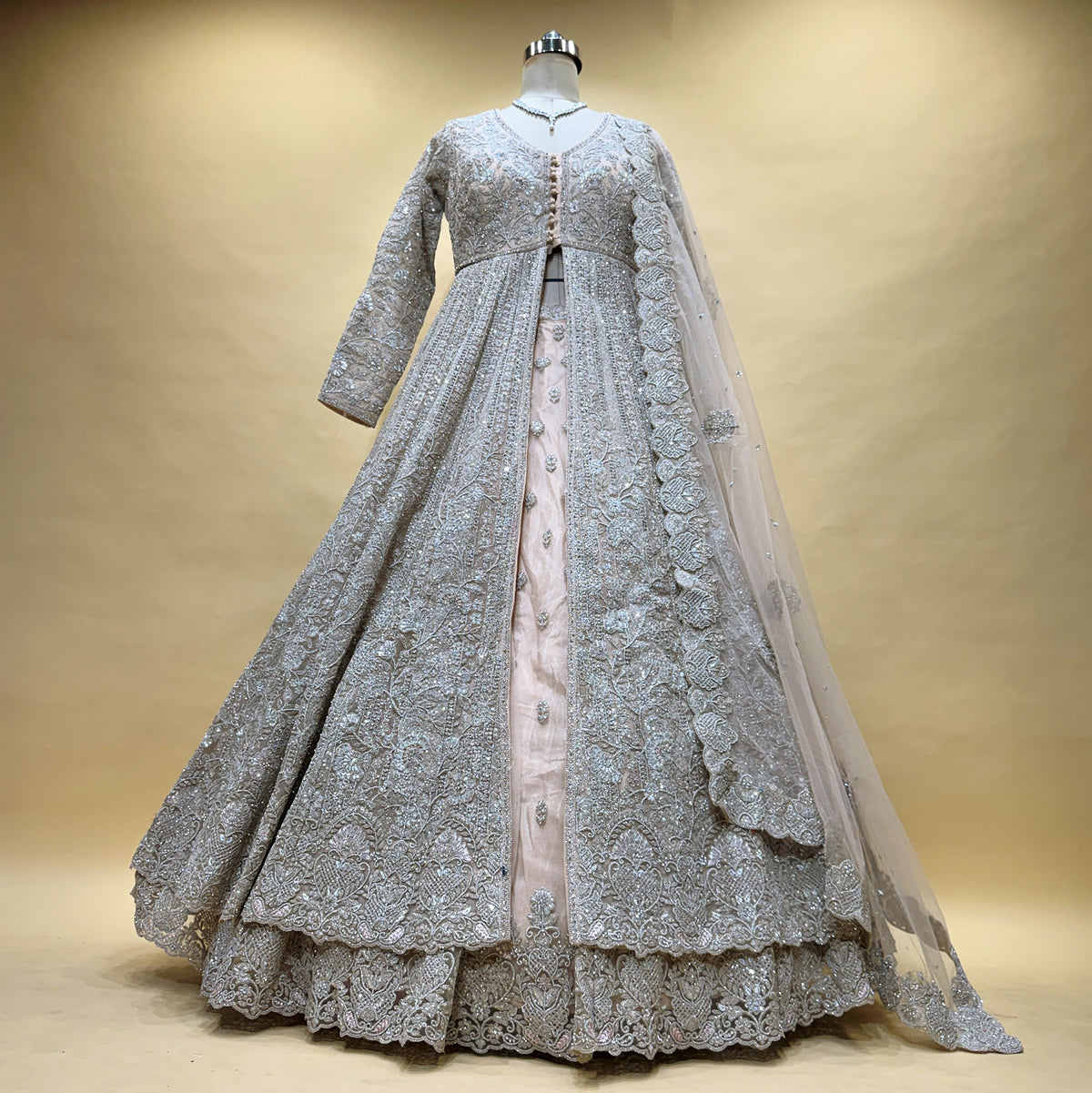 The Amber Fort Collection: Peach Heritage Lehenga Ensemble – Peach – view 1