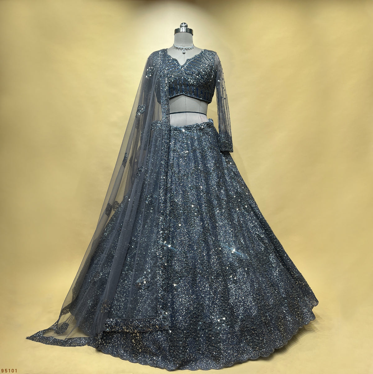 The Utsav Darbar: Grey Net Lehenga Ensemble I – Grey – view 1