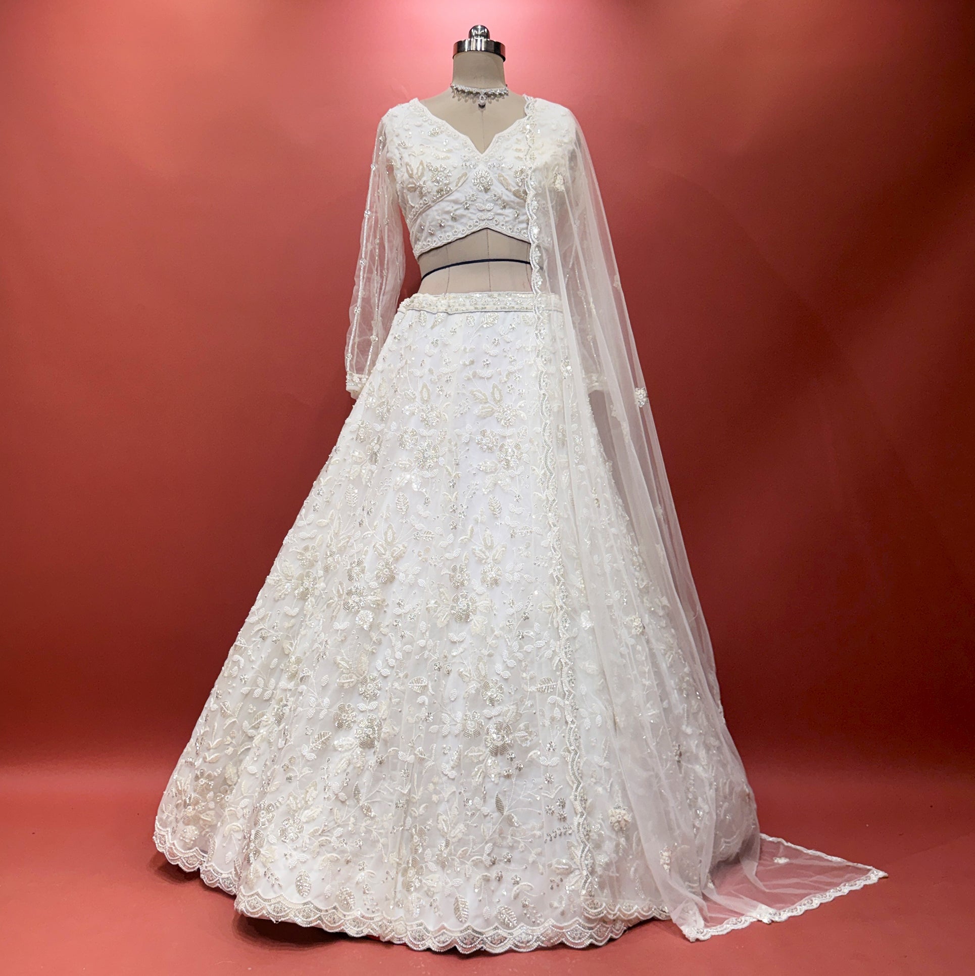 The Parampara Darbar: Pink Net Lehenga Ensemble IV – Baby Pink – view 2