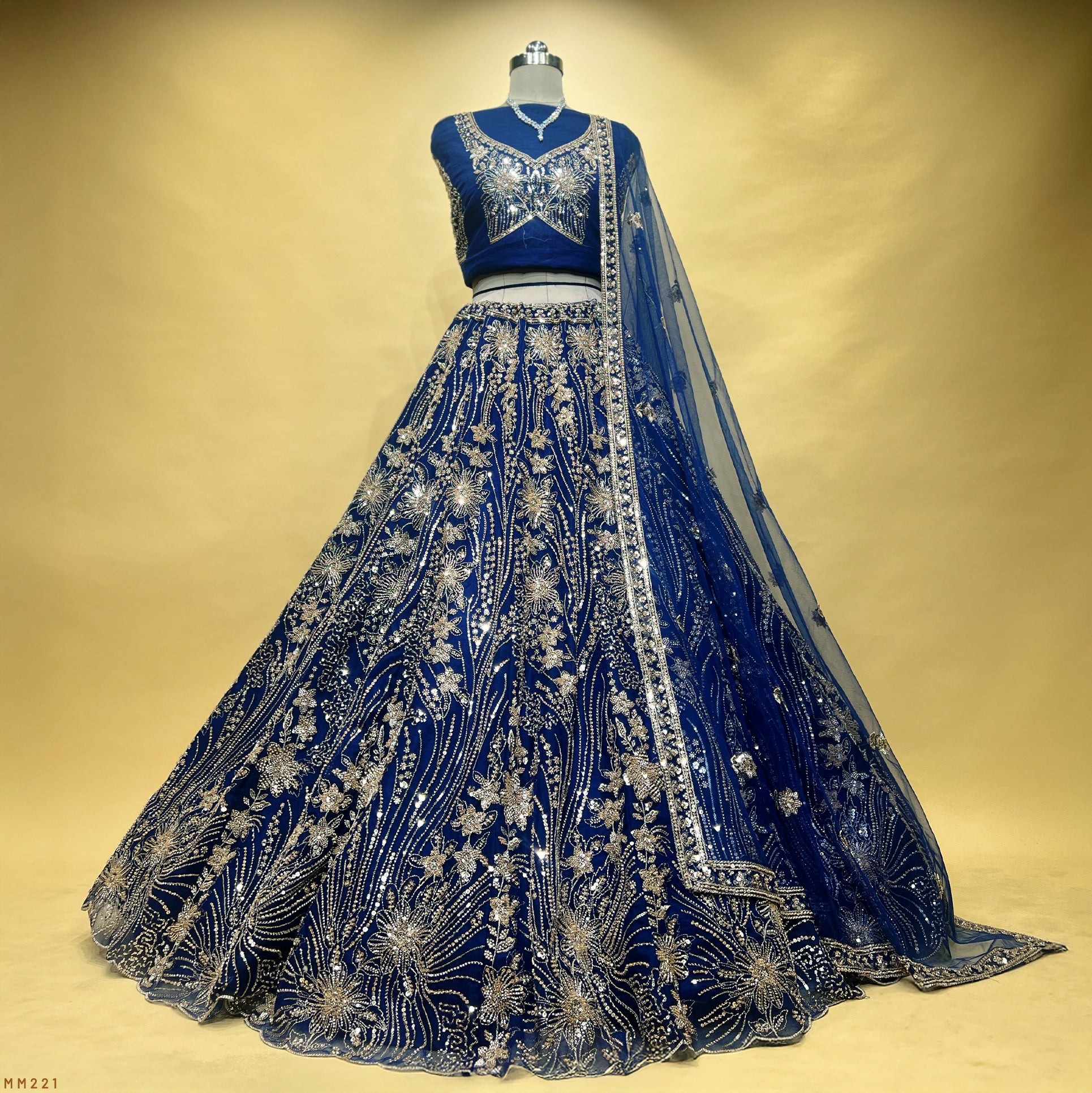 The Jharokha Heirloom Darbar: Blue Net Lehenga Ensemble II – Blue – view 1