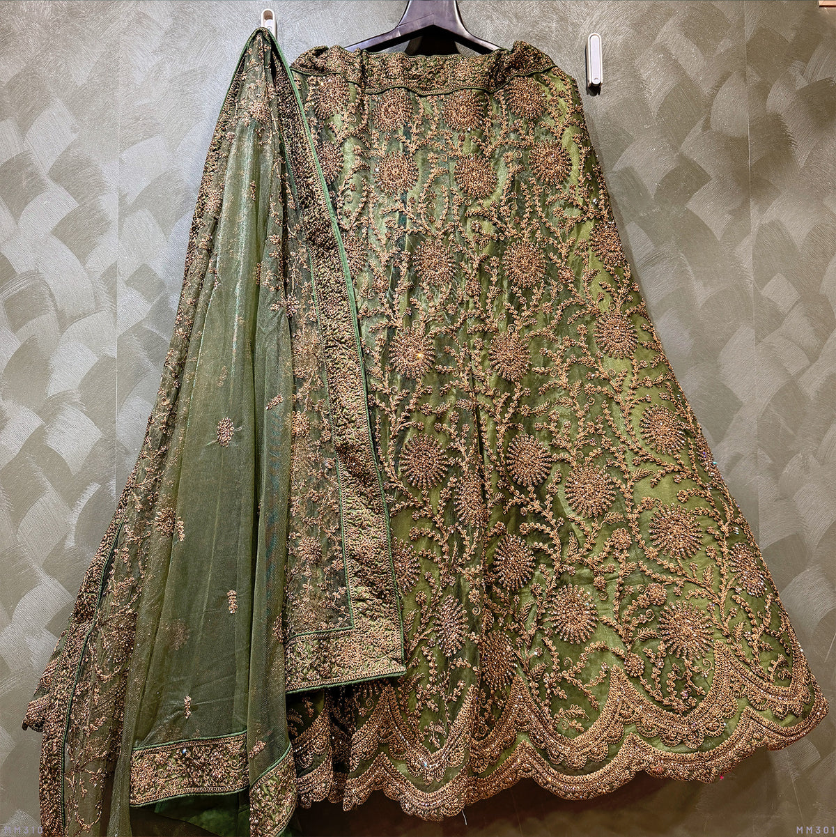 The Mangalam Darbar: Green Net Lehenga Ensemble I – Green – view 1