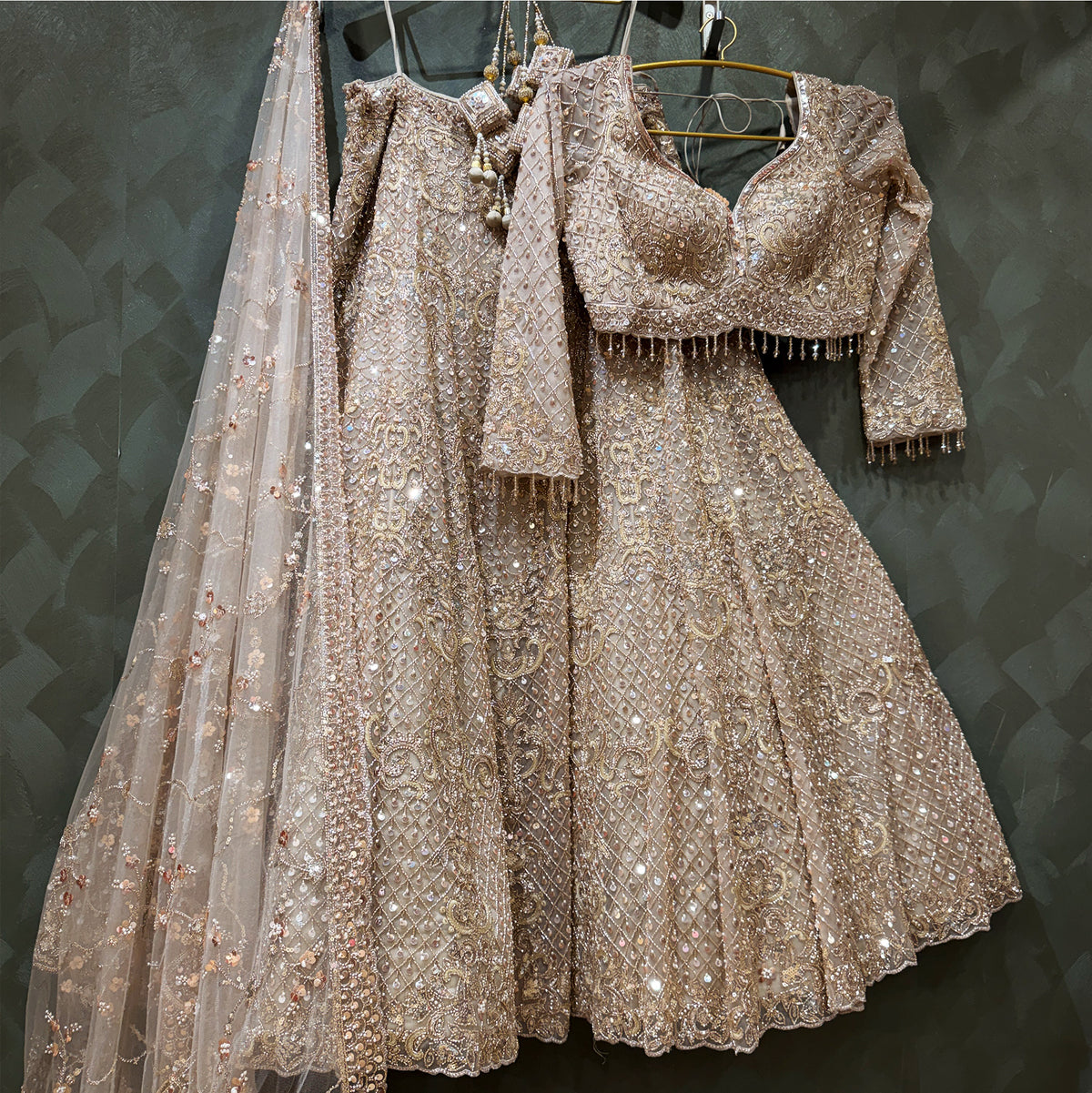 The Shagun Collection: Ivory & Gold Net Lehenga Ensemble – Ivory and Gold – view 1